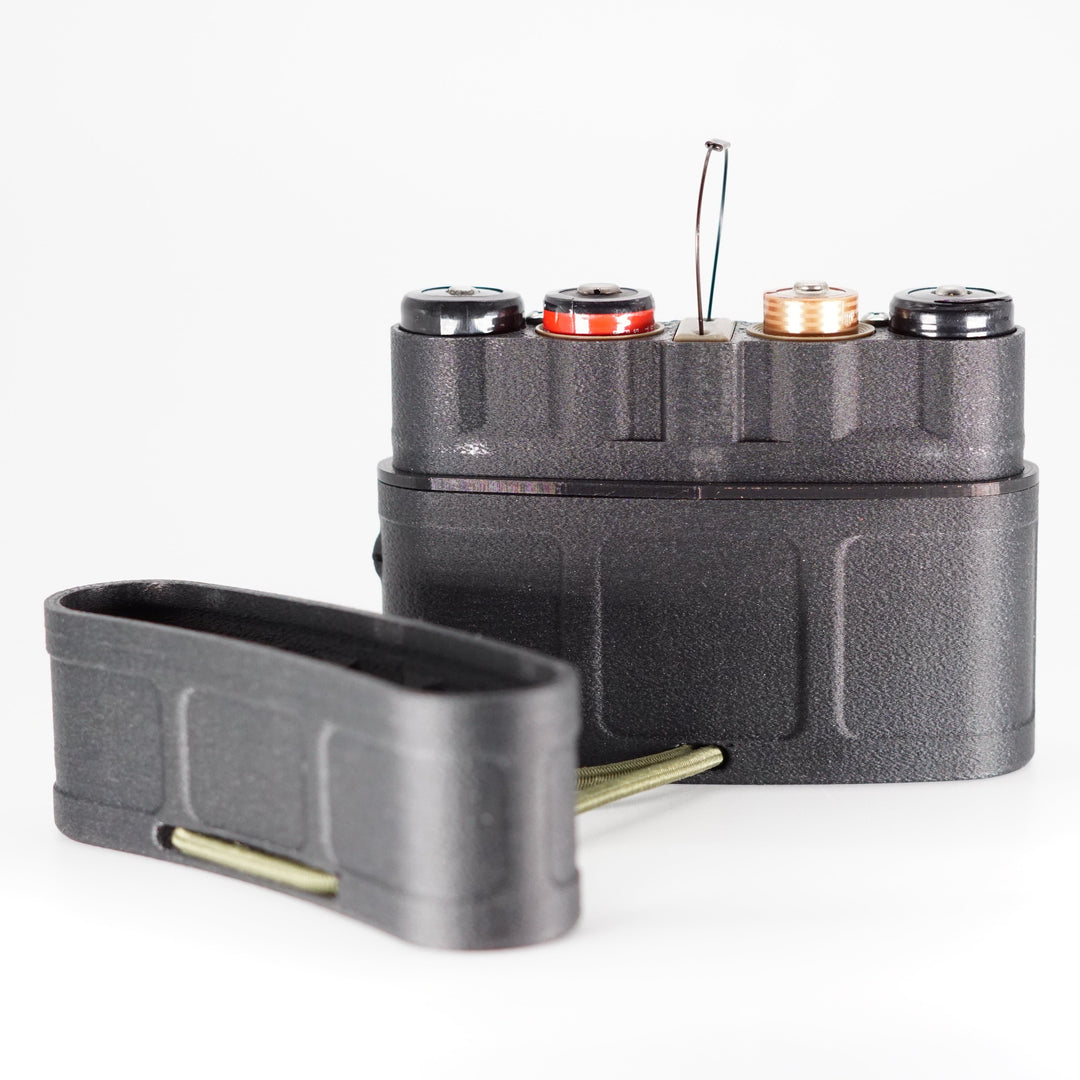 NODSBACK™ unit with batteries sitting upright with the top taken off showing the battery loadout . 
