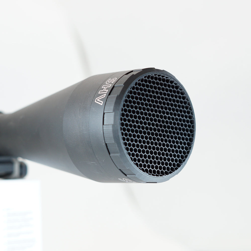 Close-up of a Paradise Tactical ARD with honeycomb pattern on a white background